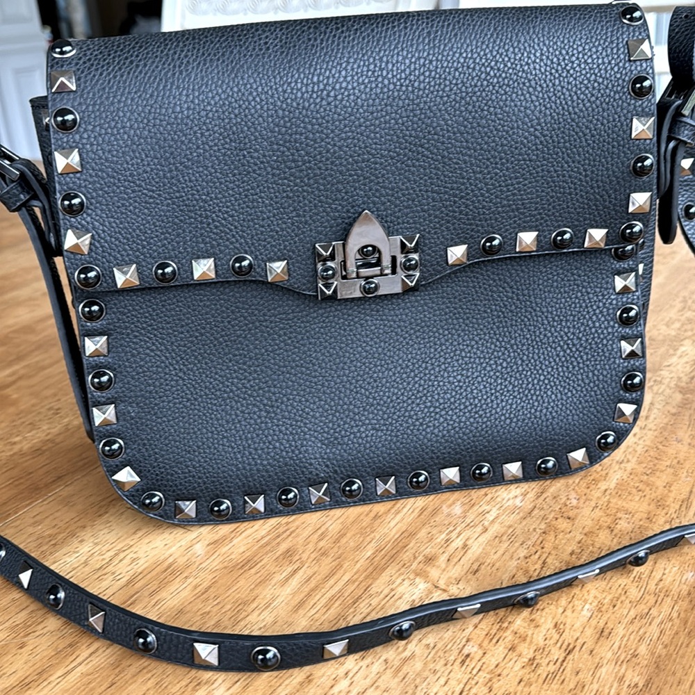 INZI Studded Crossbody. It is a great medium size cross body. Like new